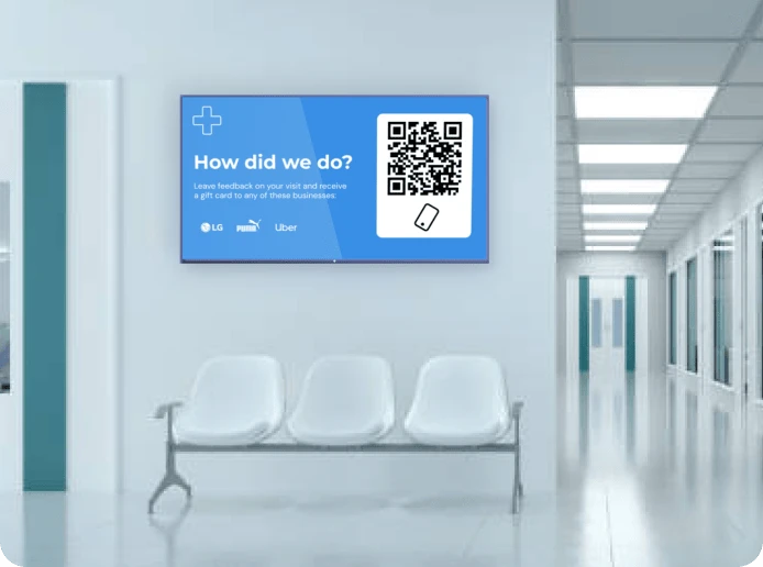 A waiting room TV screen displays a QR code for patients and guests to leave reviews