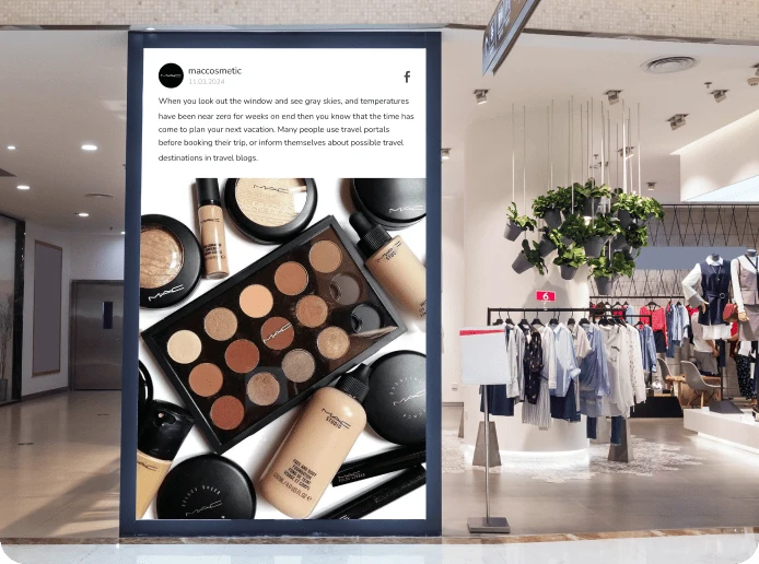 A commercial retail digital signage screen displays a feed from the store's Instagram profile